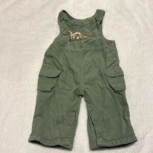 Adorable green dinosaur coveralls overalls with easy buttons. Pair with a onesie